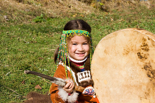 istock child with tambourine 147253156