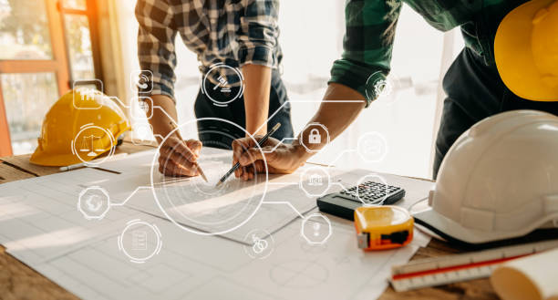 istock Engineer Teamwork Meeting, Drawing working on blueprint meeting for project working with partner on model building at company office. Asian industry professional team 1472532288