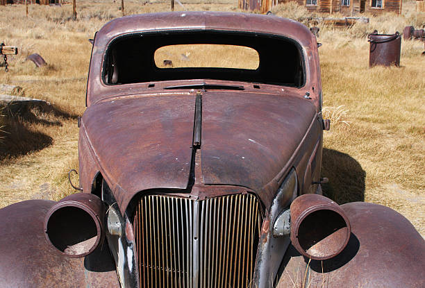 Old hot rod in decay stock photo