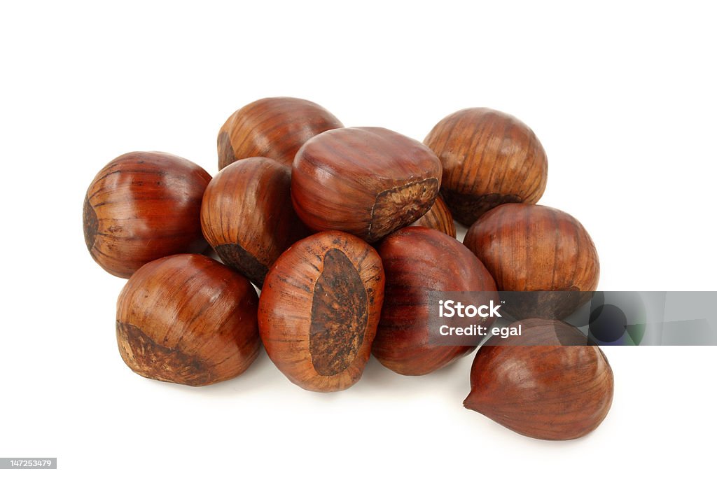 Chestnuts Chestnuts isolated on white background Brown Stock Photo