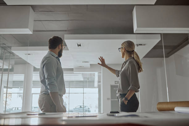 Architecture, home renovation and property, architect team and interior design, construction and collaboration. Man with woman, share idea or vision for remodel, teamwork and designer with contractor