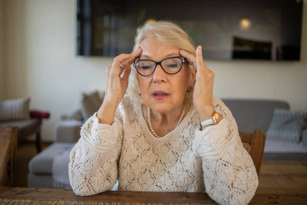istock Senior woman suffering from pain 1472538003