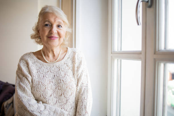 istock Happy senior woman 1472545482