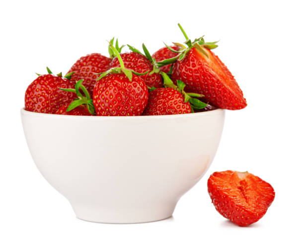 bowl with strawberries isolated on white background stock photo