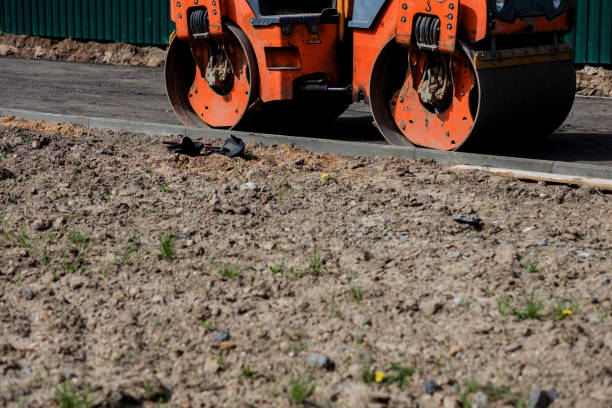 istock Laying of new modern asphalt. 1472549416