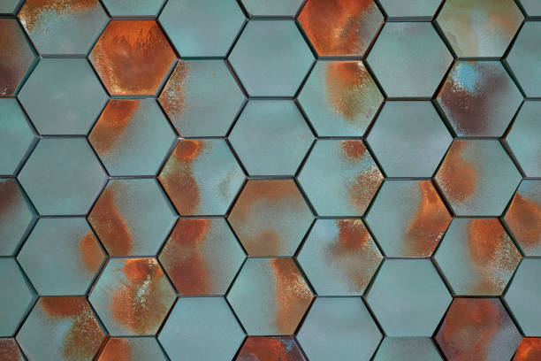 istock Hexagonal tiles in teal blue with rust-like orange marks, repeated pattern of six-sided polygons in shades of blue-green 1472551239