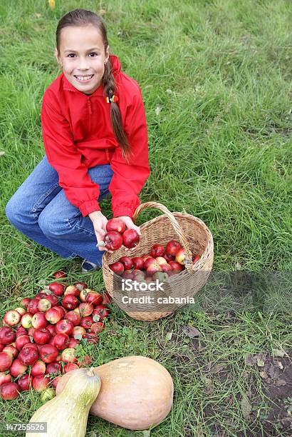 Preteen Girl On Grass Stock Photo - Download Image Now - Apple - Fruit, Basket, Beautiful People