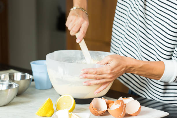istock Woman hands kneading the dough while cooking apple pie 1472555605
