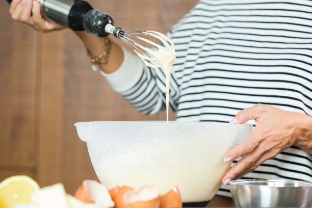 istock Woman hands kneading the dough while cooking apple pie 1472556417