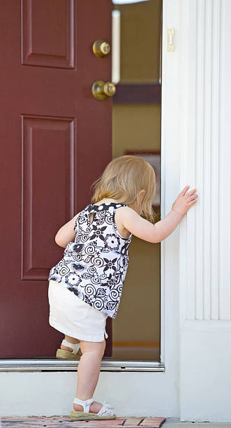 istock Little Girl Going into Home 147255751