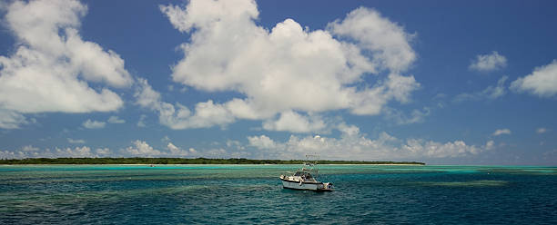 istock Tropical Island panorama with yacht 147255803