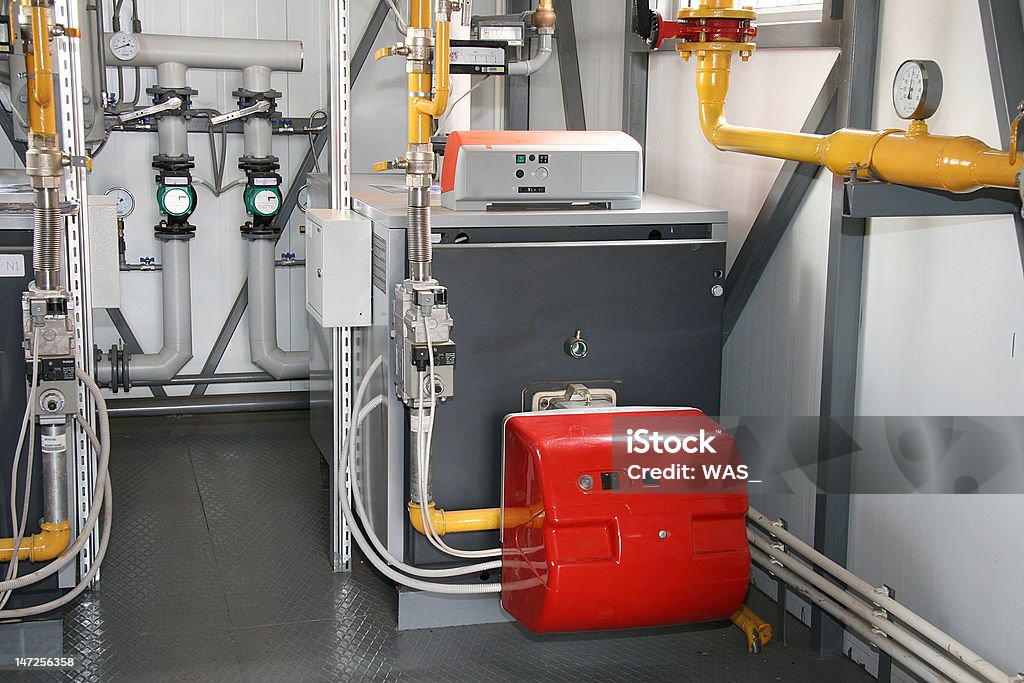 The gas boiler The gas steel boiler established in modern independent boiler-house Agricultural Machinery Stock Photo