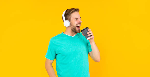 istock listen to music. wireless device accessory. new technology. 1472563875