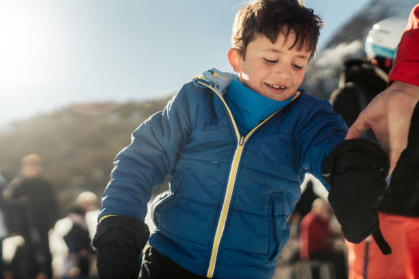 Family throwing snowbals