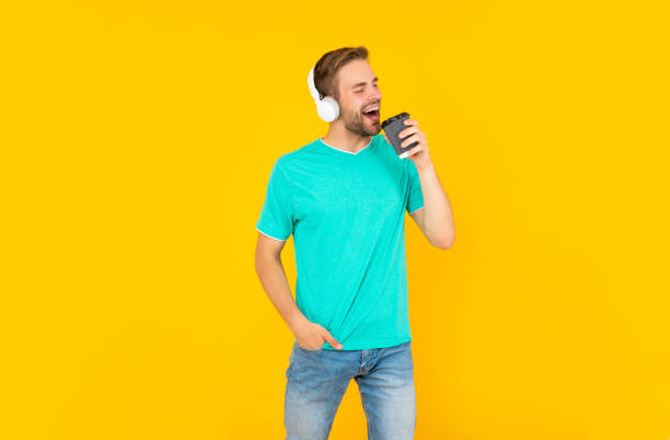 istock music lover. listen to music. wireless device accessory. new technology. 1472566456