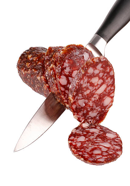 Smoked sausage and knife stock photo