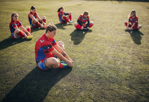 istock Female rugby team training together 1472570019