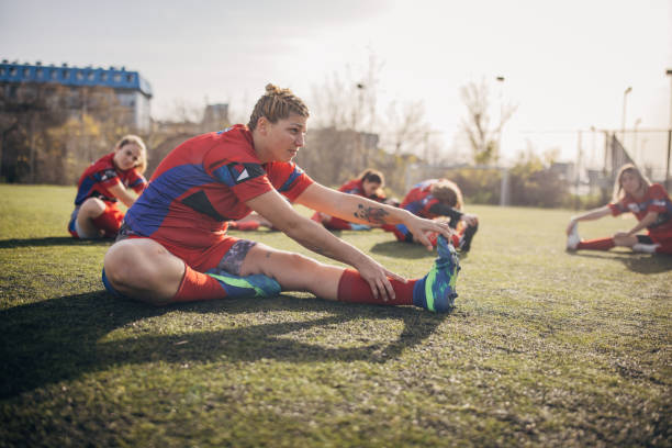 istock Female rugby team training together 1472570104