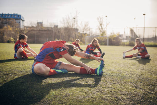 istock Female rugby team training together 1472570636