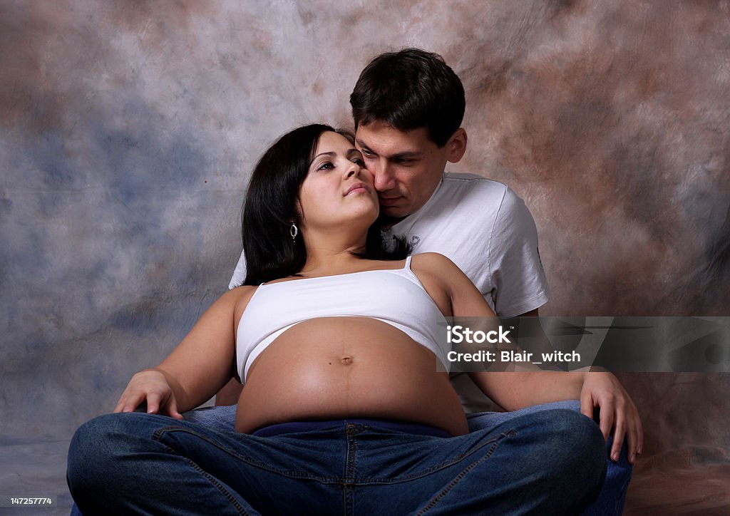 Relaxing Expectant couple relaxing New Life Stock Photo