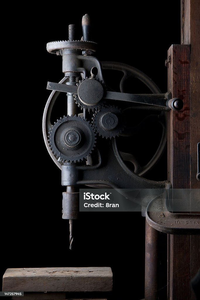 Antique Drill Press This is a drill press is mounted in a blacksmith shop on a centennial farm in Michigan. Antique Stock Photo