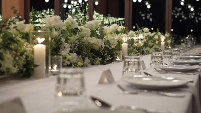 Luxury romantic wedding decoration candles in glass, honeymoon destination tropical anniversary dinner. Close-up