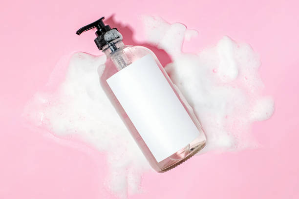 istock Bottle of shampoo or liquid soap with blank label, 1472585073