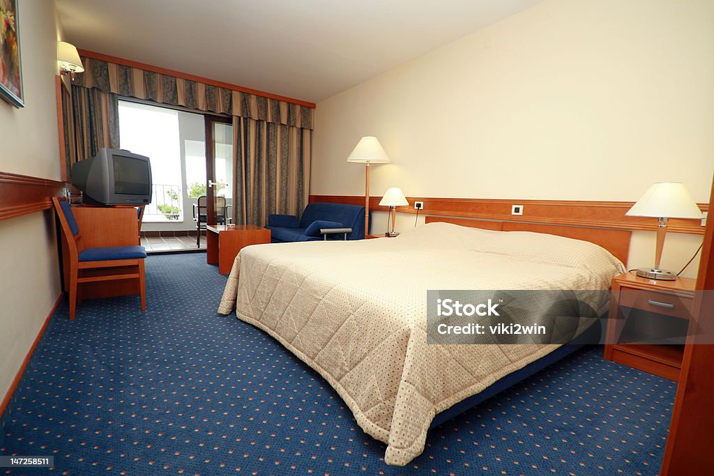 Hotel-Zimmer - Lizenzfrei Bett Stock-Foto