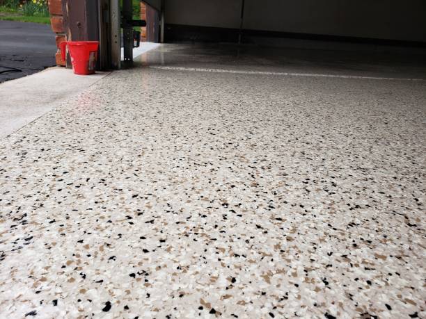 Epoxy floor system for garage floor concrete with epoxy coating in a garage epoxy resin floor stock pictures, royalty-free photos & images