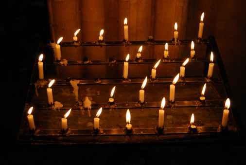 Church offering candles. Shot inside the chapel at Trinity College, Oxford.