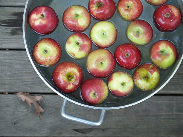 bobbing for apples anyone? stock photo