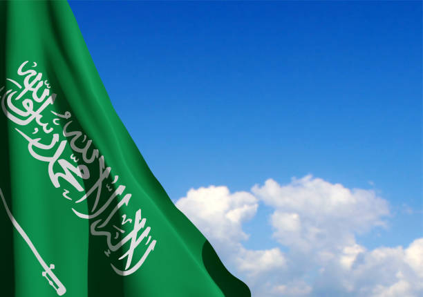 istock Saudi Arabia national flag on background of sky 1472590417