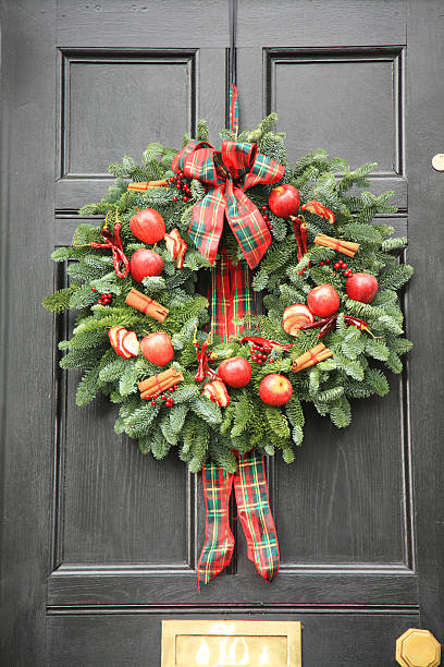 istock Red apple and chillies modern Christmas wreath 147260223