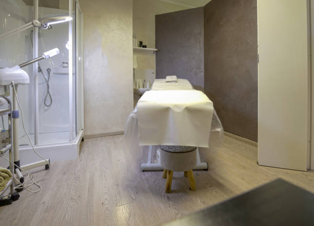 istock massage beds in a massage clinic 1472602345