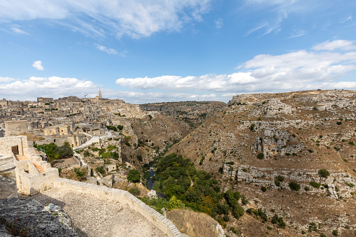 View of the Sassi di Matera a historic district in the city of Matera, well-known for their ancient cave dwellings. Basilicata. Italy