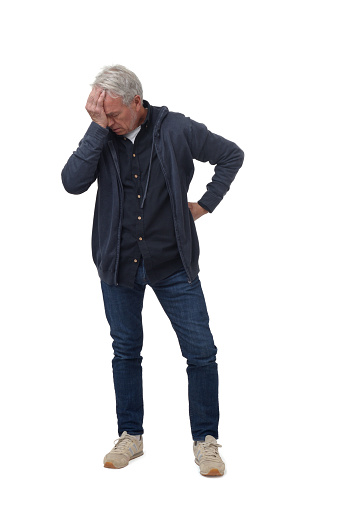 full length portrait of a man in headache pain isolated on white