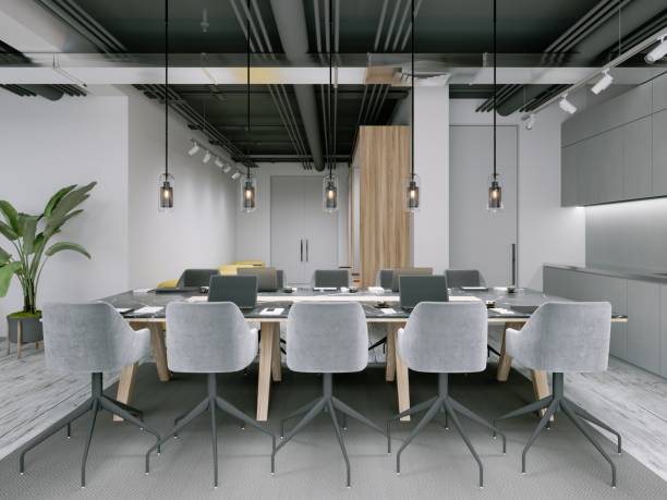 istock Office space with a large table for conferences and negotiations with clients. 1472604253