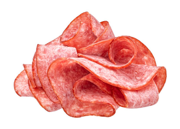 istock Sliced salami sausage isolated on white background 1472605891