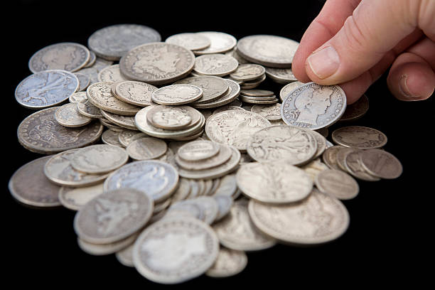 istock Hand Reaching for Coins from Savings – Horizontal 147260598