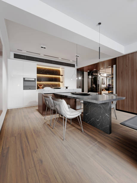istock Contemporary fitted kitchen design with white paneling and black marble backsplash with black marble side dining table. 1472611198
