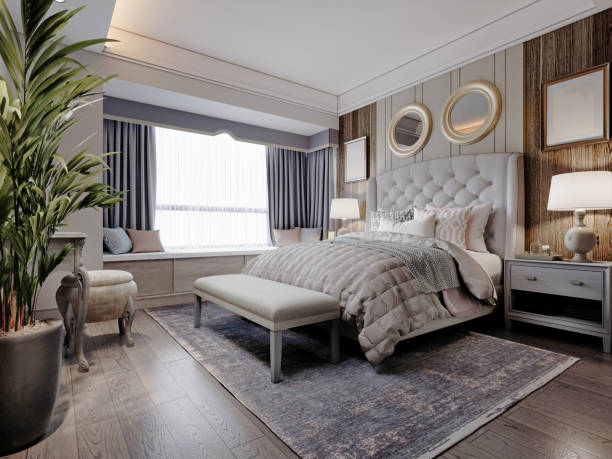 istock American design bedroom with white large bed with quilted headboard with wall paneling and dark wood parquet. 1472616279