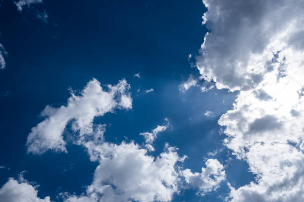 istock Blue Sky and White Cumulus Clouds 1472617306