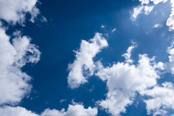 istock Blue Sky and White Cumulus Clouds 1472617338