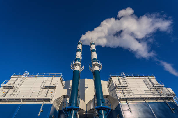 istock Biomass power plant chimneys 1472617946