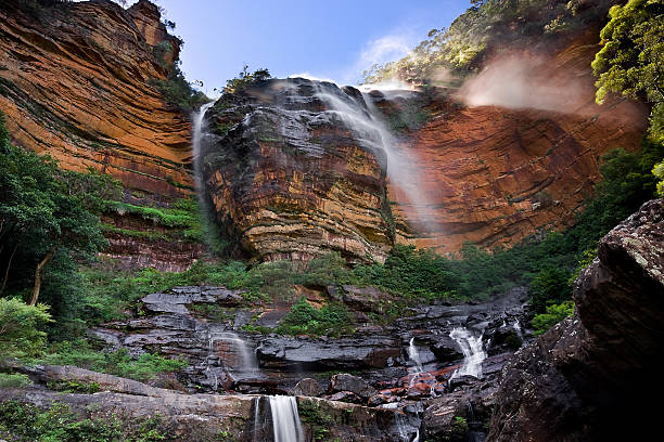 Waterfall in the mountains stock photo