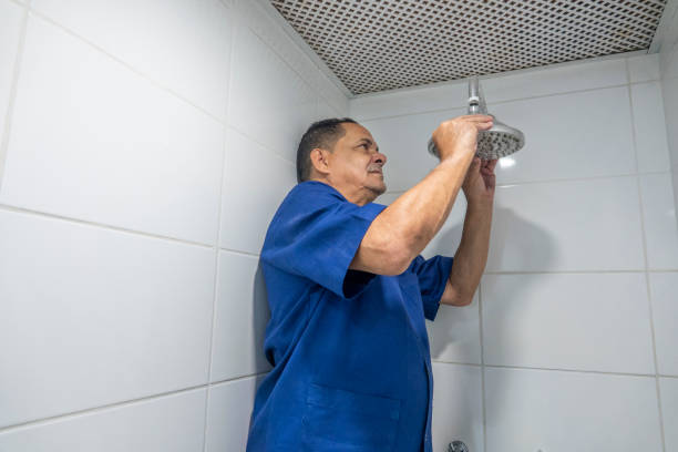 istock Plumber repairing an apartment shower 1472624771