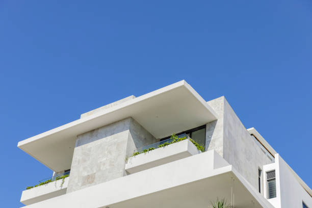 istock Closeup new, modern apartment building, background with copy space 1472625025