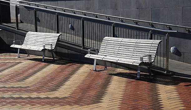 Two park benches stock photo