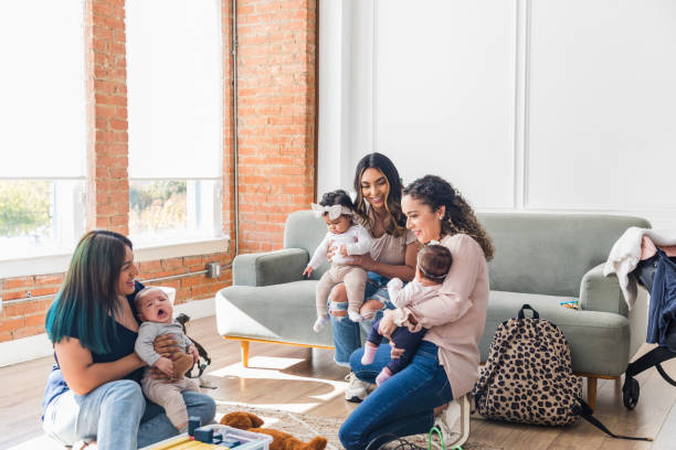 istock Young women with babies gather for new moms support group 1472625125