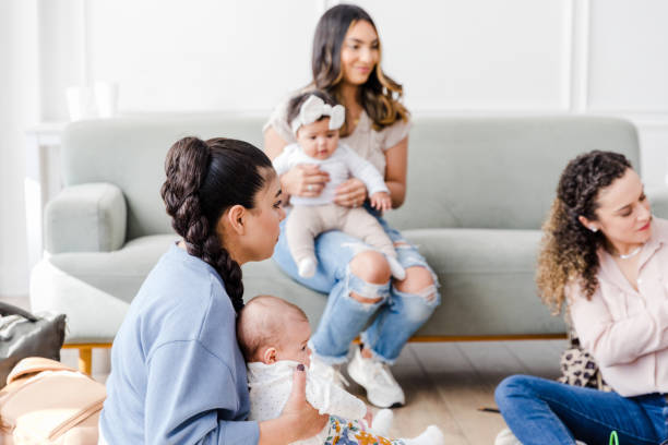 istock Proud new mom shows off her baby 1472625134